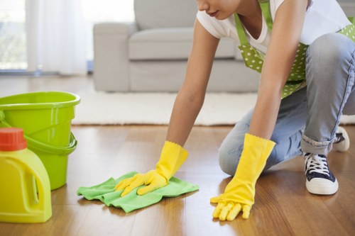 Deep cleaning a lounge sofa with specialist equipment