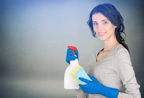 Professional carpet cleaners in Wallington inspecting and treating a carpet